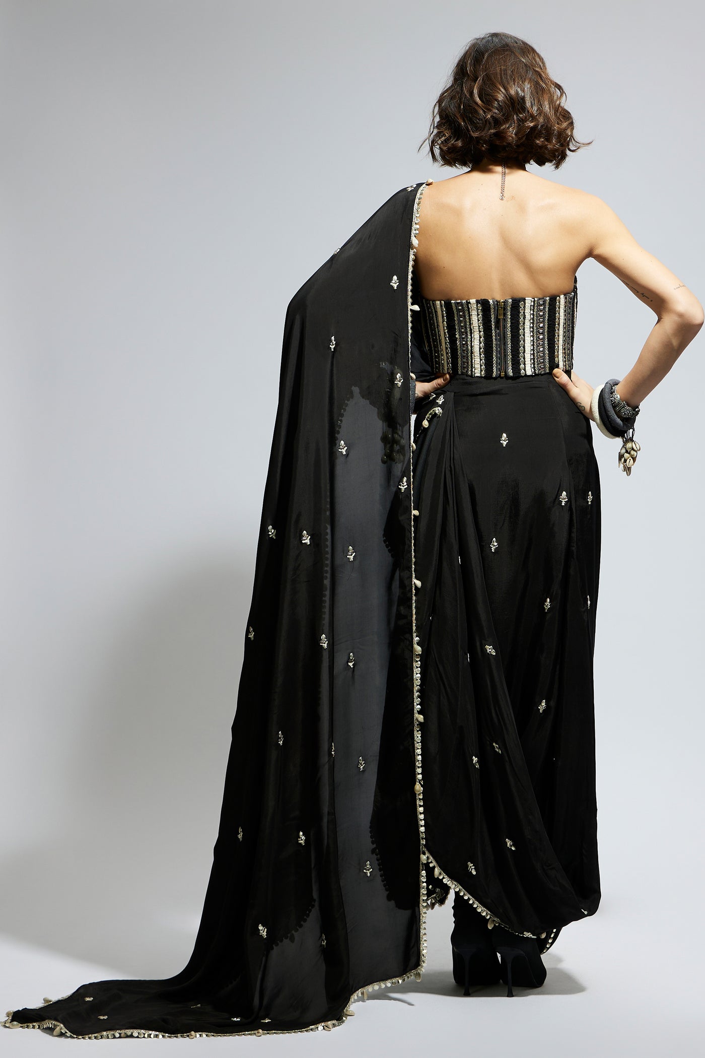 SVA Black Threadwork Corset Paired With Embellished Saree Draped Skirt indian designer wear online shopping melange singapore