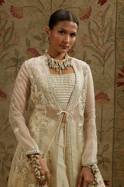 Magnolia Cream Organza Embellished Jacket Paired with Metal Bustier and Skirt