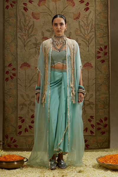 SVA Womenswear Teal Blue Thread Tassle Cape Paired with Metal Embellished Bustier and Drape Skirt Indian Designer Wear Melange Singapore