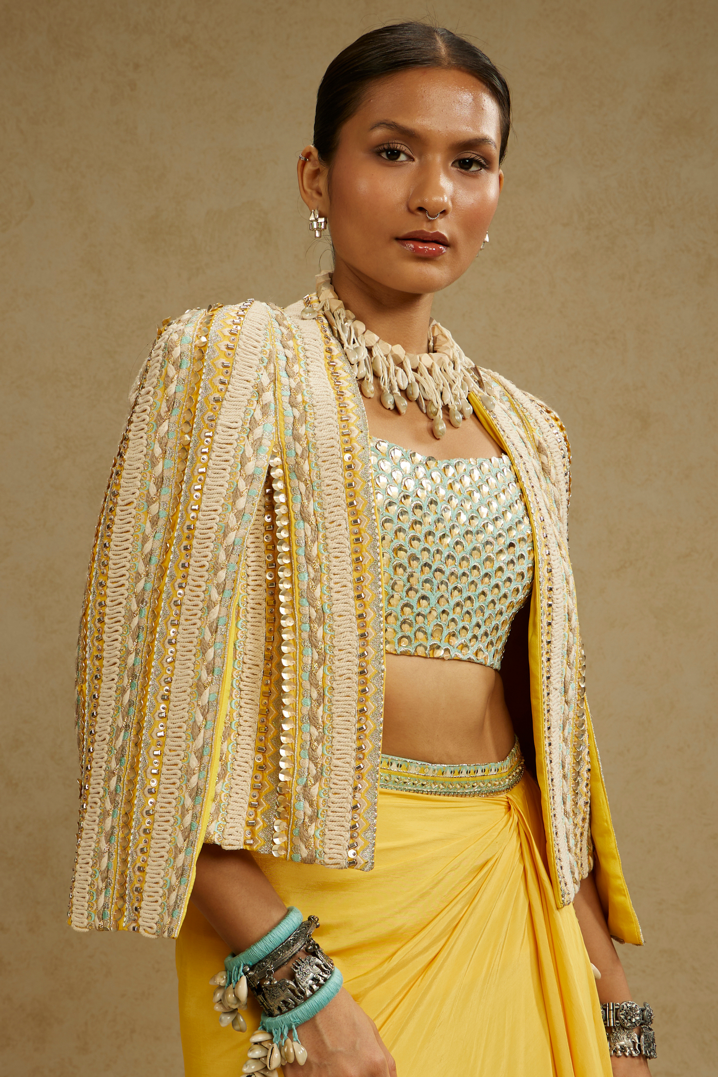 SVA Womenswear Dandelion Yellow Embellished Jacket Paired with Embellished Bustier and High Slit Skirt Online Shopping Indian Designer Wear Melange Singapore