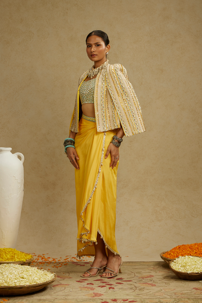 SVA Womenswear Dandelion Yellow Embellished Jacket Paired with Embellished Bustier and High Slit Skirt Online Shopping Indian Designer Wear Melange Singapore