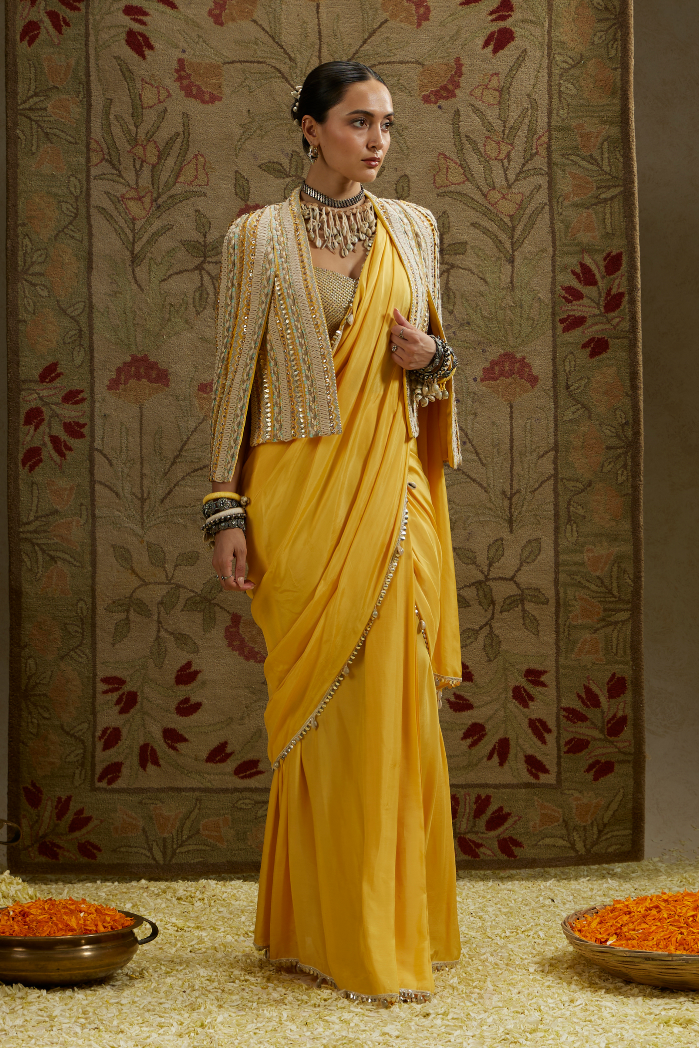 SVA Dandelion Yellow Cascade Saree Paired with Metal Embellished Bustier and Embellished Cape Jacket Womenswear Indian Designer Wear Online Shopping Melange Singapore