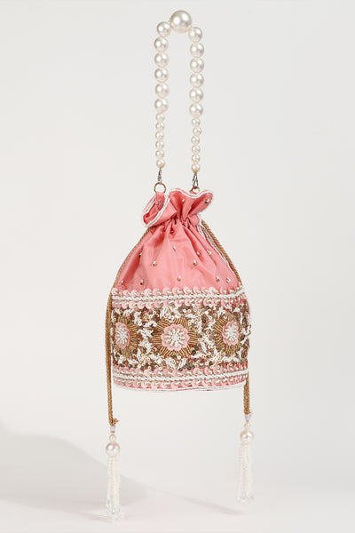 The Tan Clan Ama Pink Potli Bag With Pearl Handle indian designer wear online shopping melange singapore