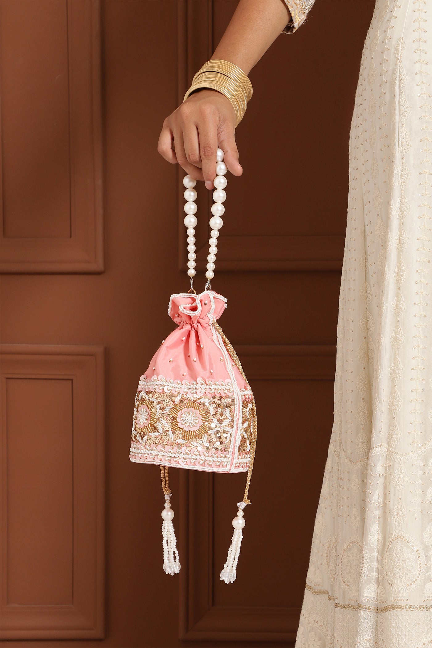 The Tan Clan Ama Pink Potli Bag With Pearl Handle indian designer wear online shopping melange singapore