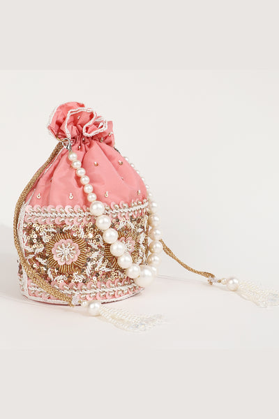 The Tan Clan Ama Pink Potli Bag With Pearl Handle indian designer wear online shopping melange singapore