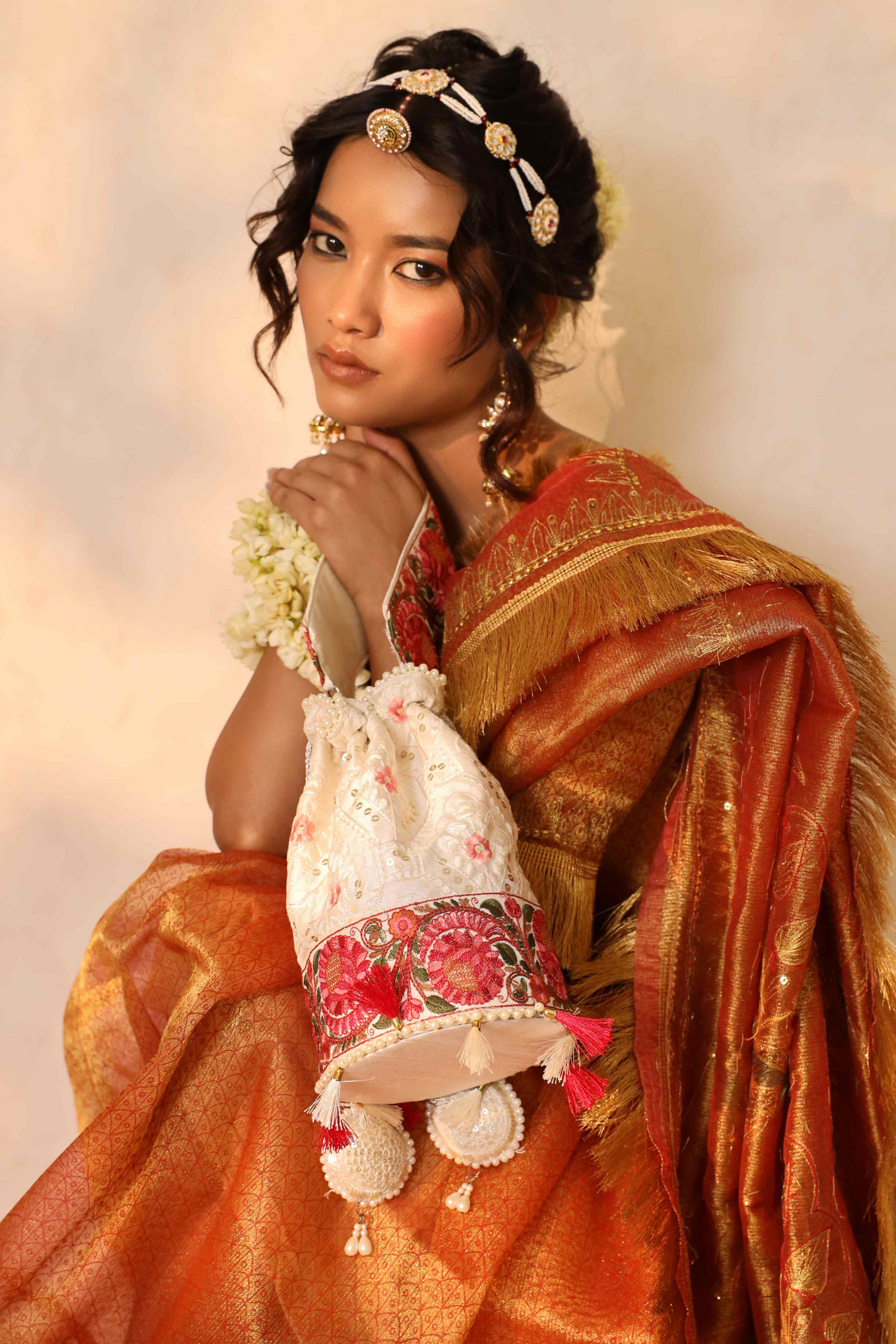 The Tan Clan Meera Potli with Detachable Handle White Indian Designer Wear Melange Singapore Gifting Womenswear