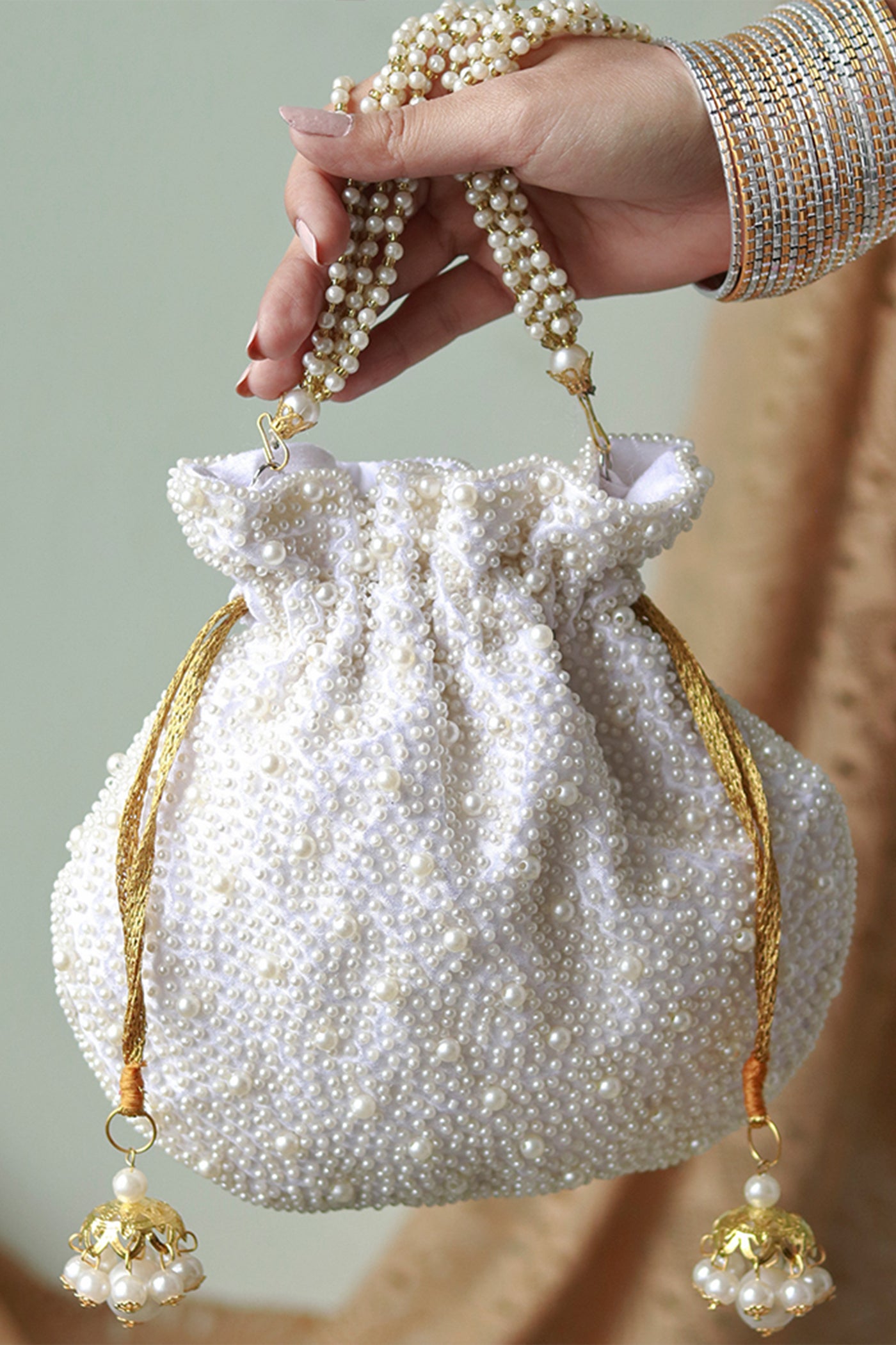 The Tan Clan Nayaab Pearl Potli Bag With Handle indian designer wear online shopping melange singapore