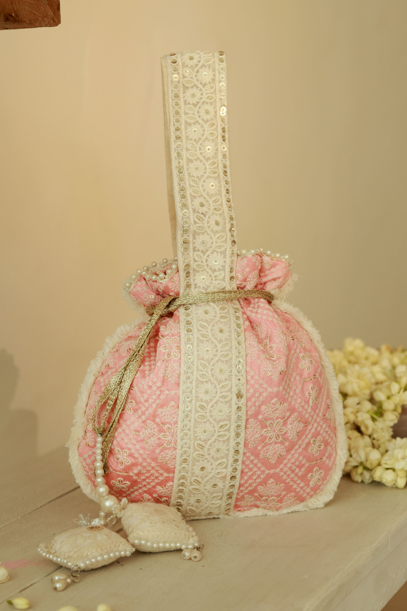 The Tan Clan Ruhi Potli Bag with Handle Pink Indian Designer Wear Online Shopping Melange Singapore Womenswear Gifting