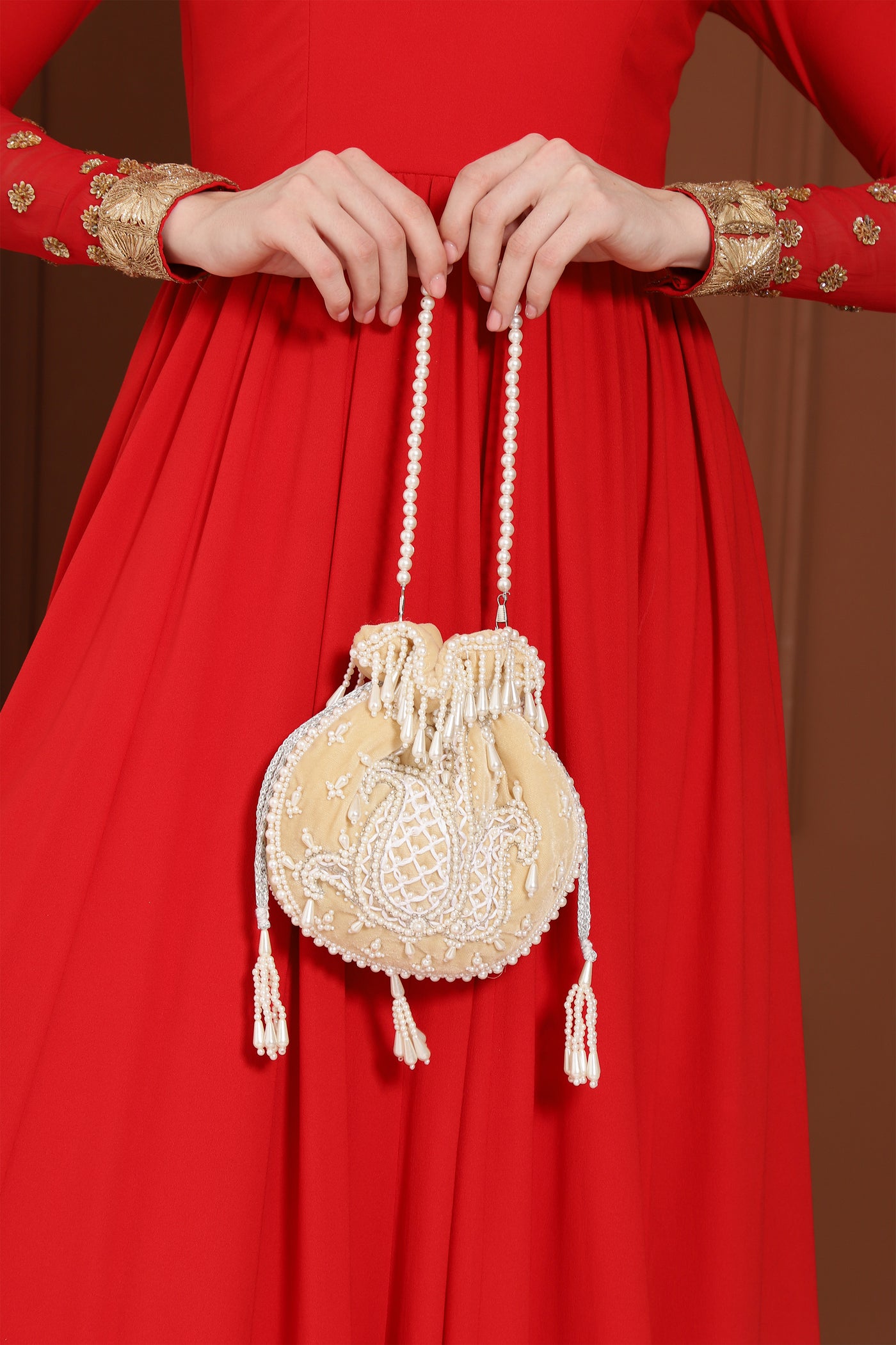 The Tan Clan Sukoon Hand Embroidered Potli With Pearl Handle indian designer wear online shopping melange singapore