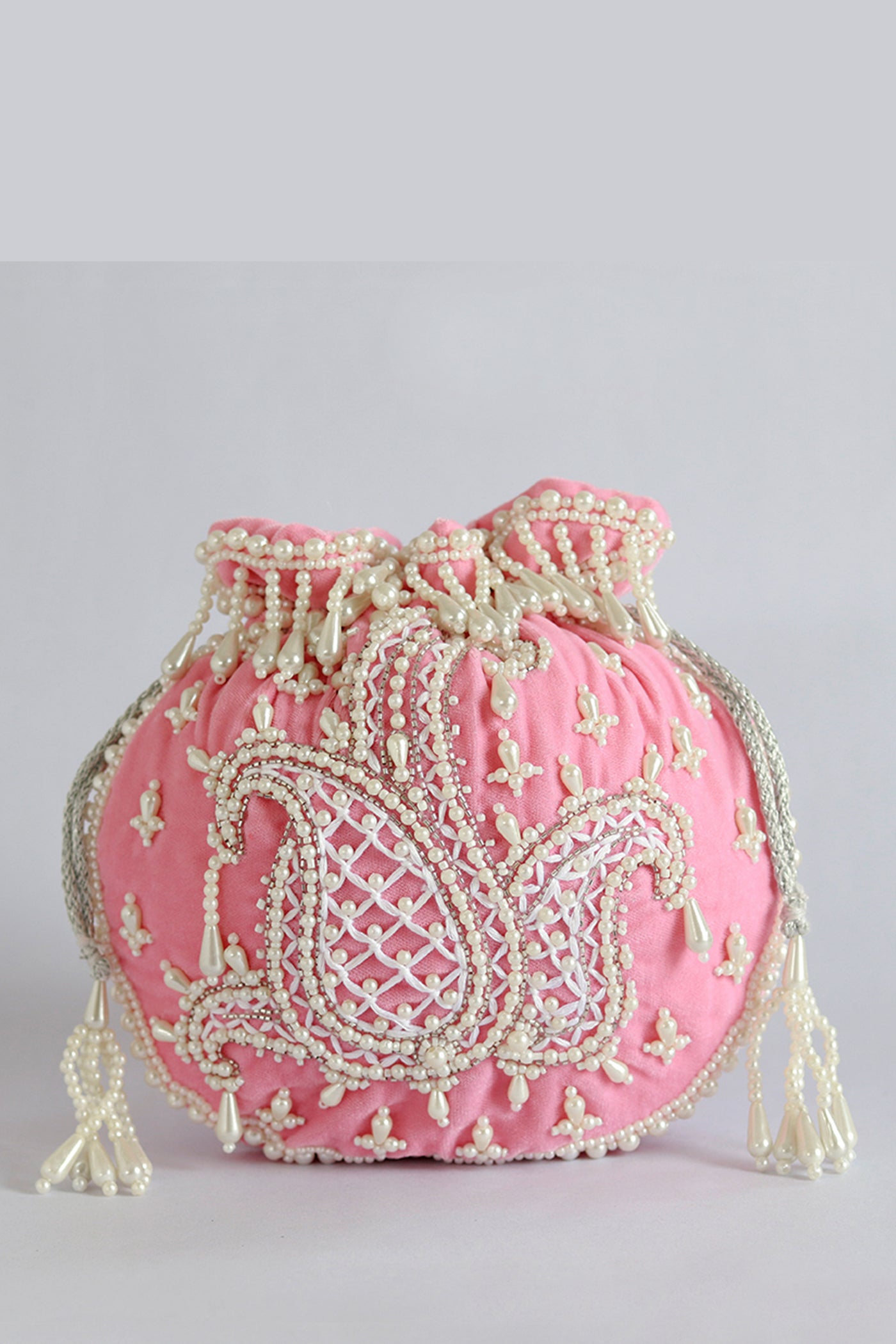 The Tan Clan Sukoon Pink Hand Embroidered Potli With Pearl Handle indian designer wear online shopping melange singapore