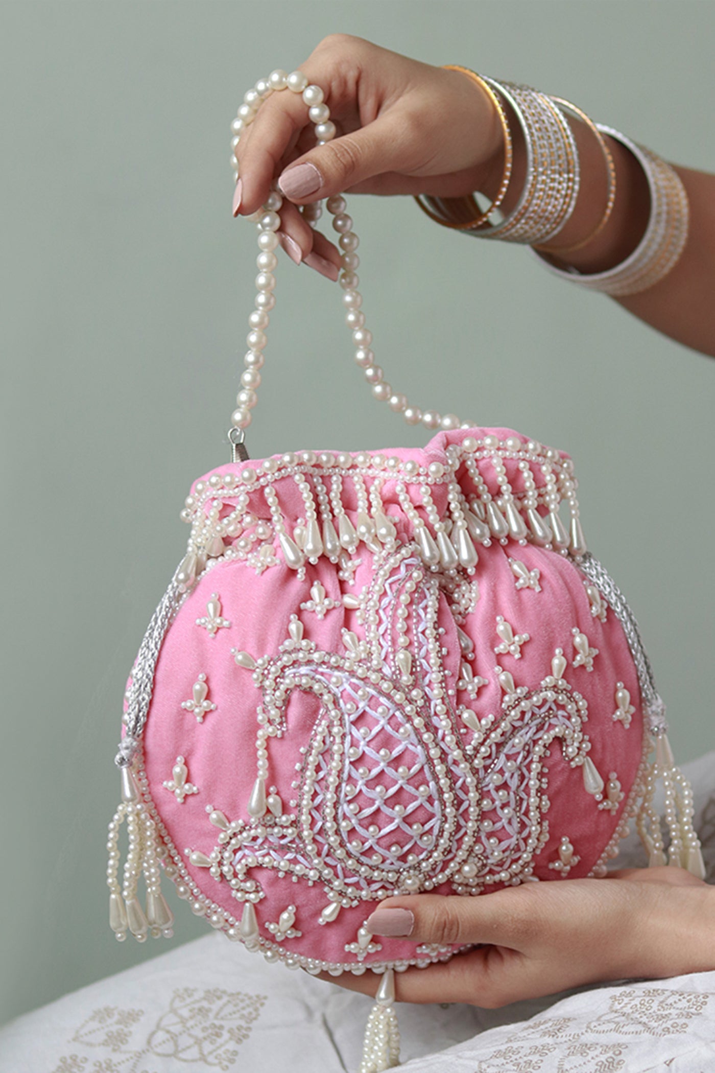 The Tan Clan Sukoon Pink Hand Embroidered Potli With Pearl Handle indian designer wear online shopping melange singapore