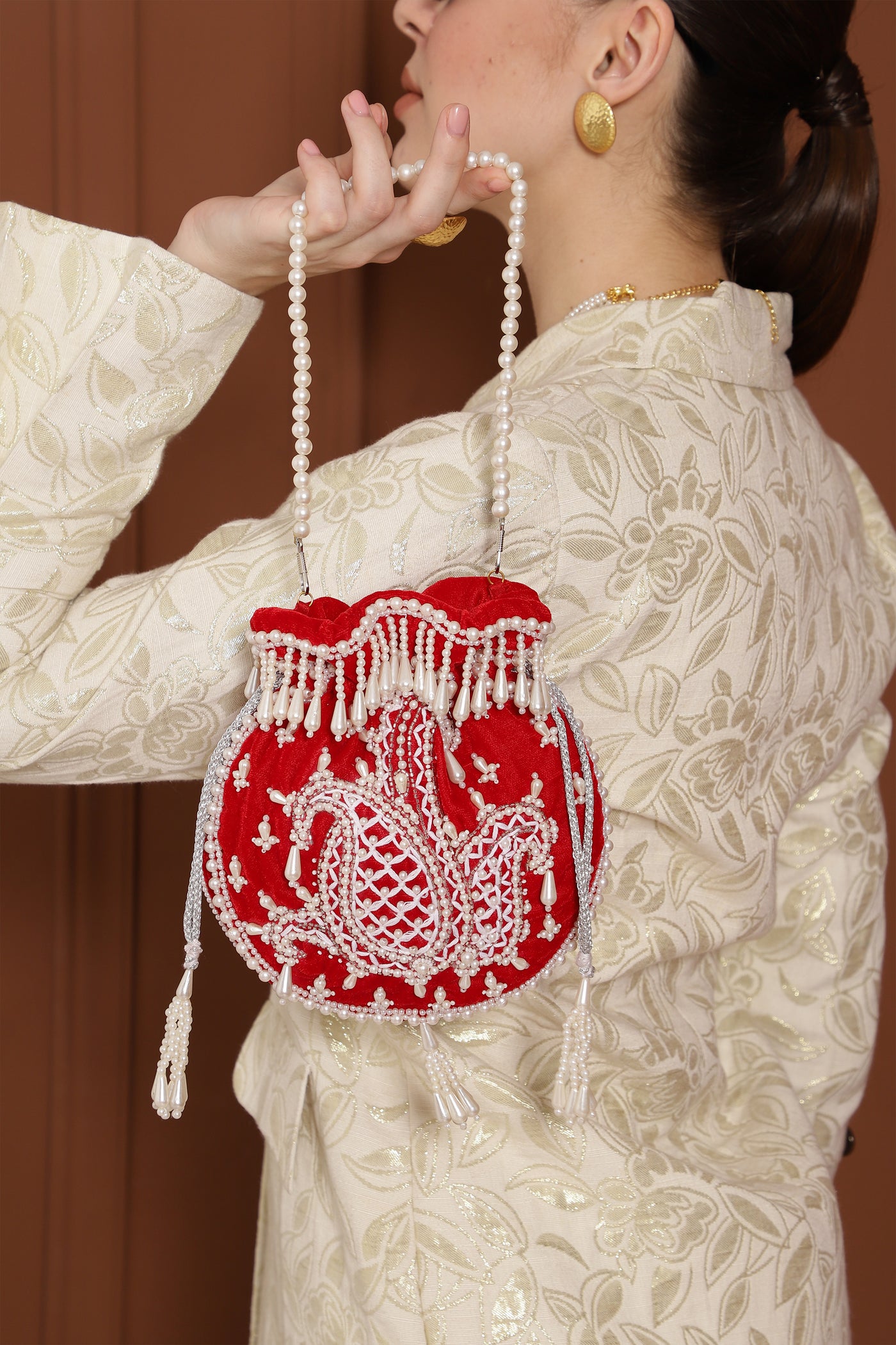 The Tan Clan Sukoon Red Hand Embroidered Potli With Pearl Handle indian designer wear online shopping melange singapore